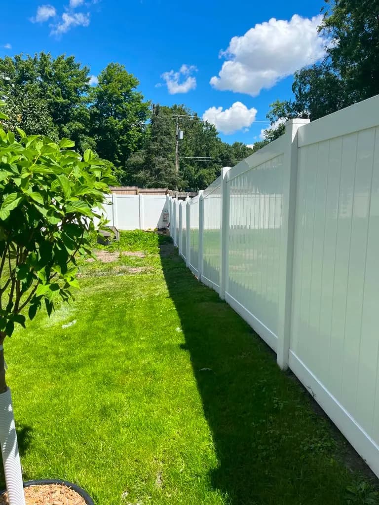 Vinyl Privacy in White installed for a residential client